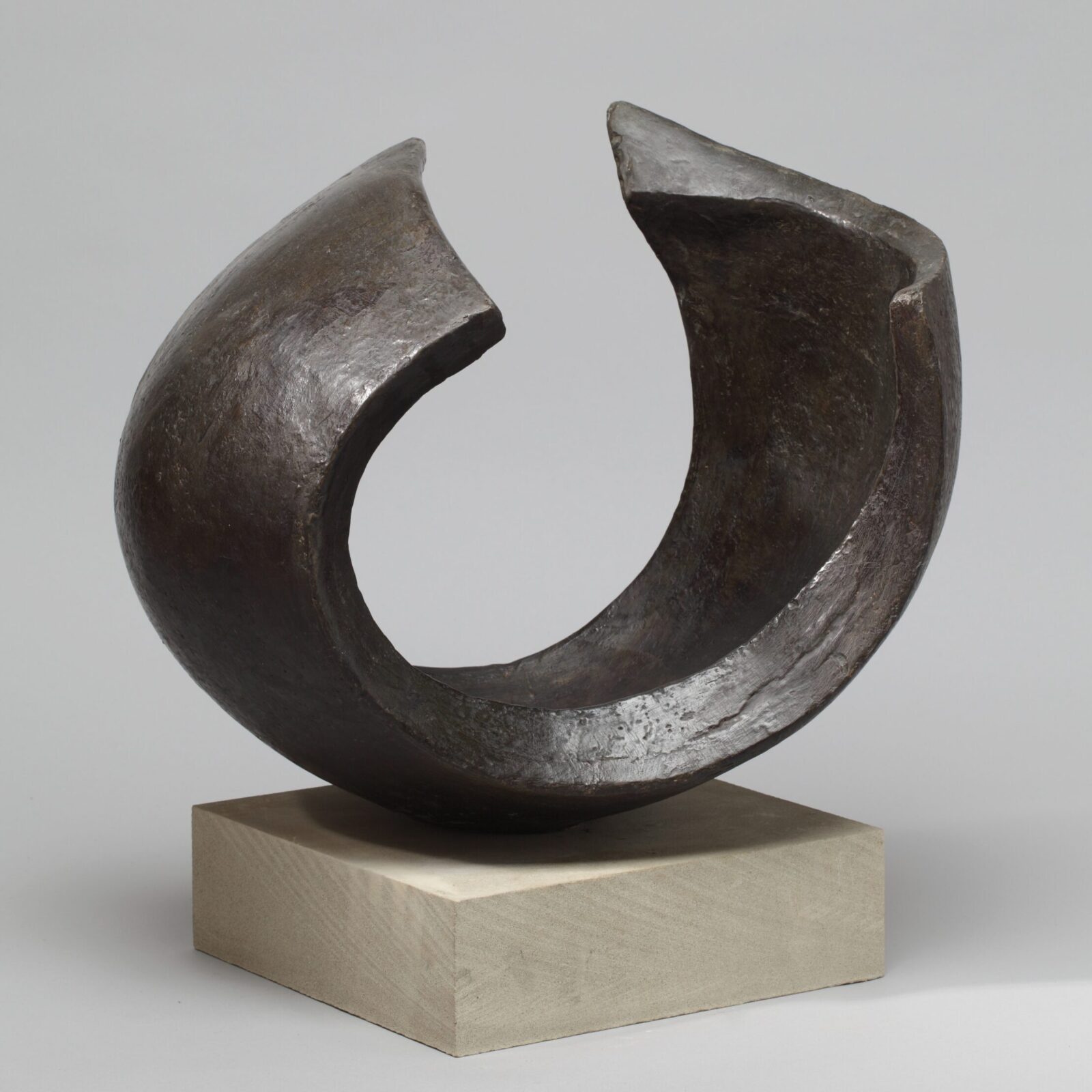 Abstract circular bronze sculpture for interior design and garden