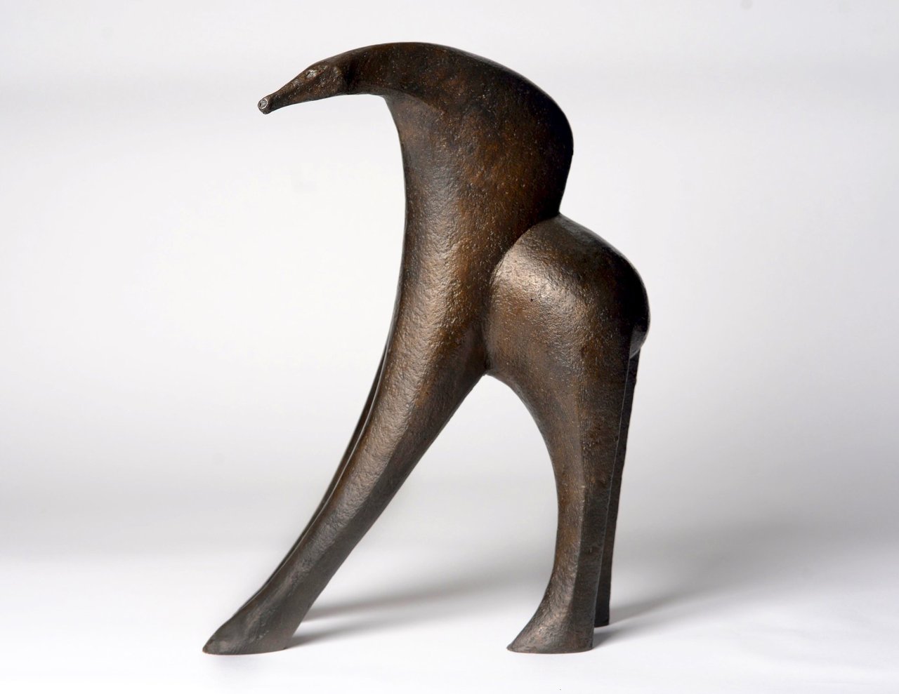 gallery commissioned modern abstract bronze sculpture of an animal for interior design