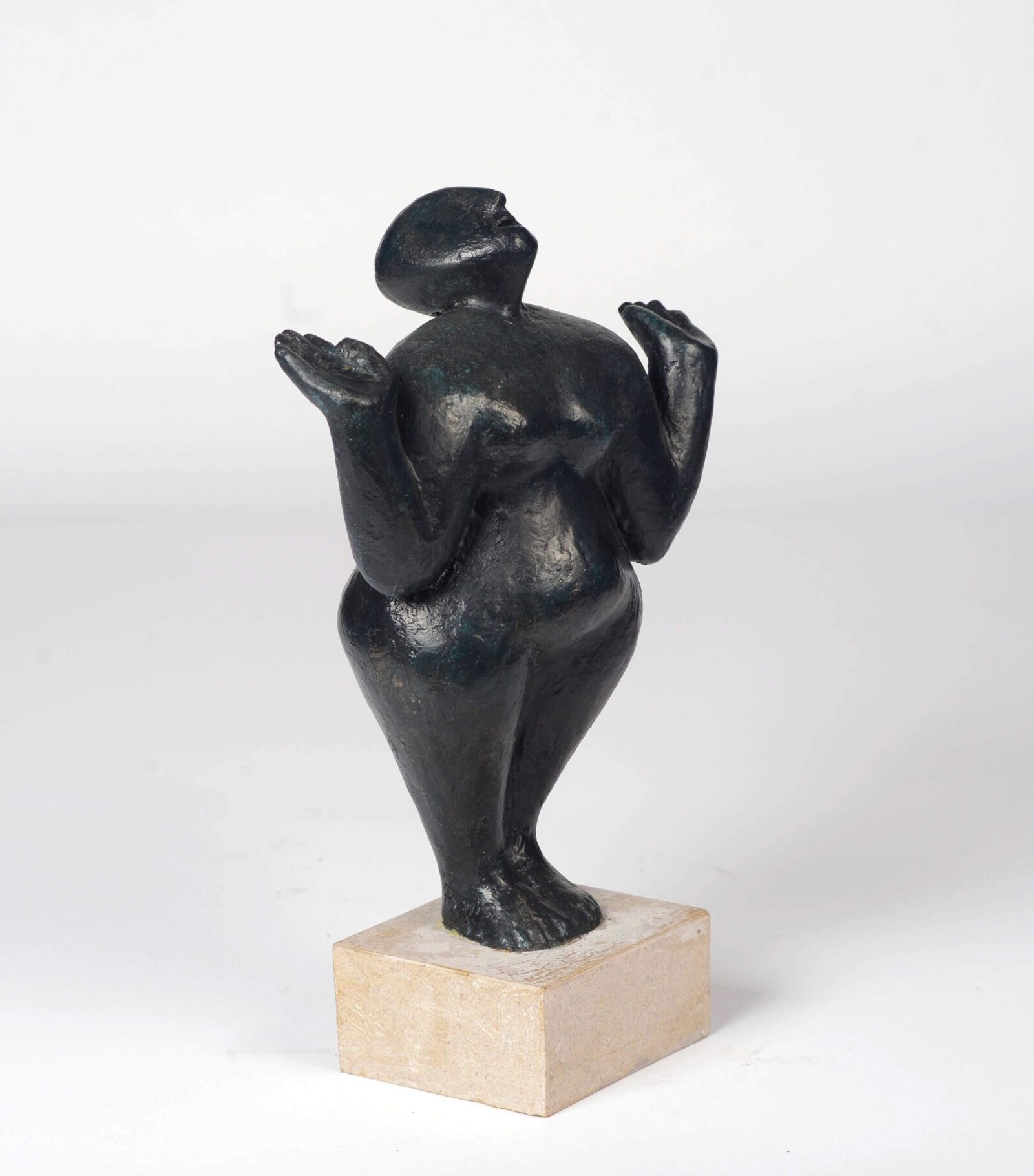 contemporary bronze sculpture of a standing figure for the home