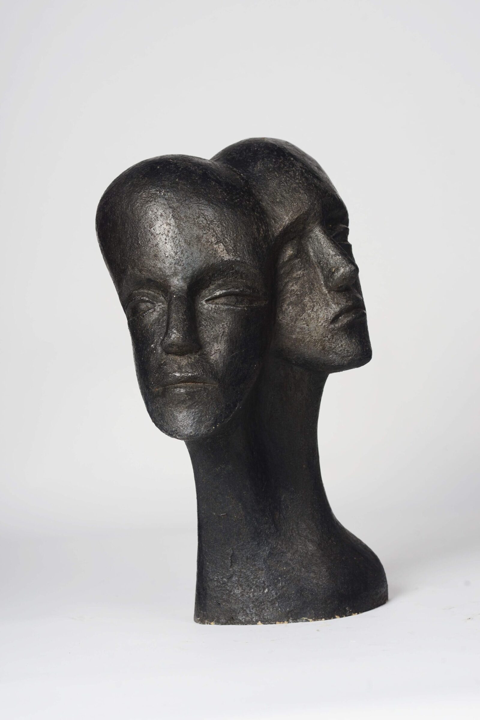 modern sculpture of a double head