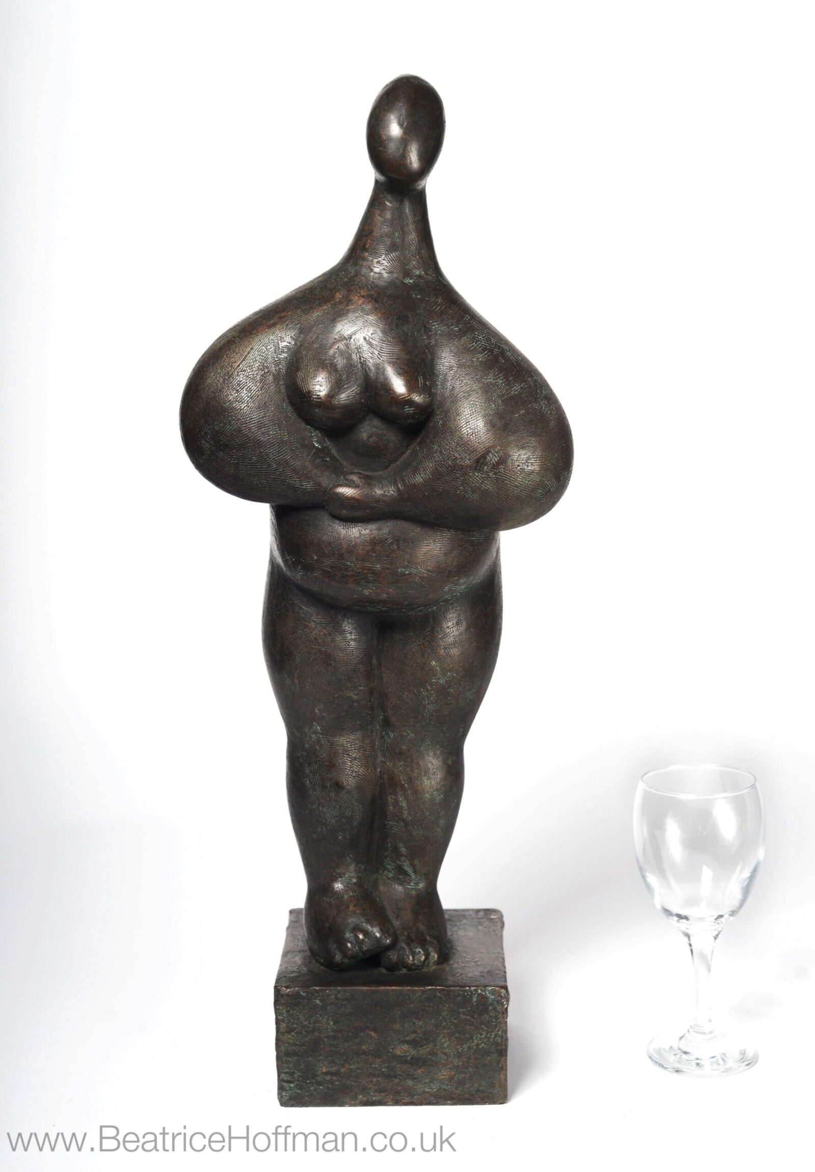 contemporary bronze sculpture of a standing abstract figure for interior design