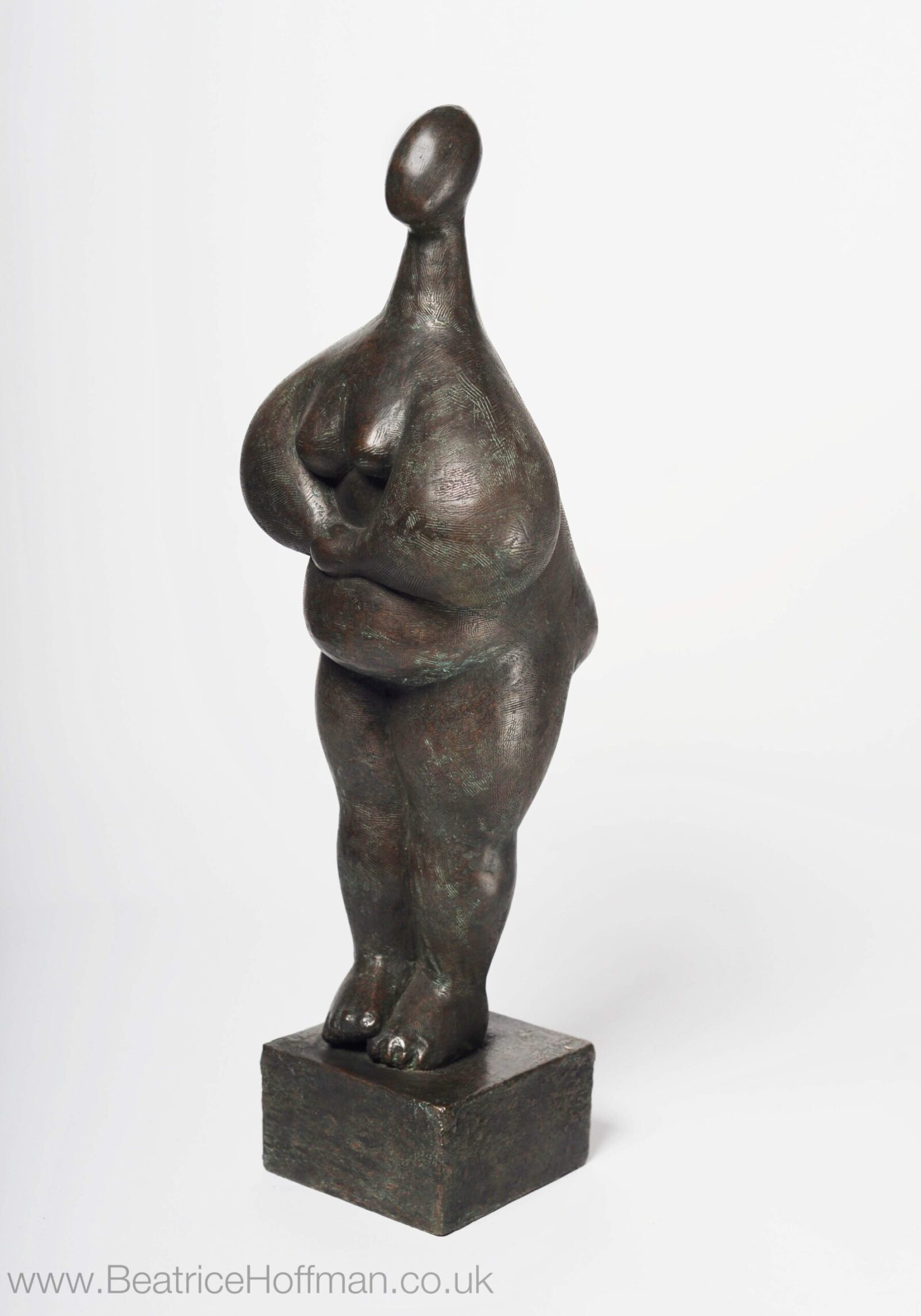 contemporary bronze sculpture of a standing abstract figure for interior design
