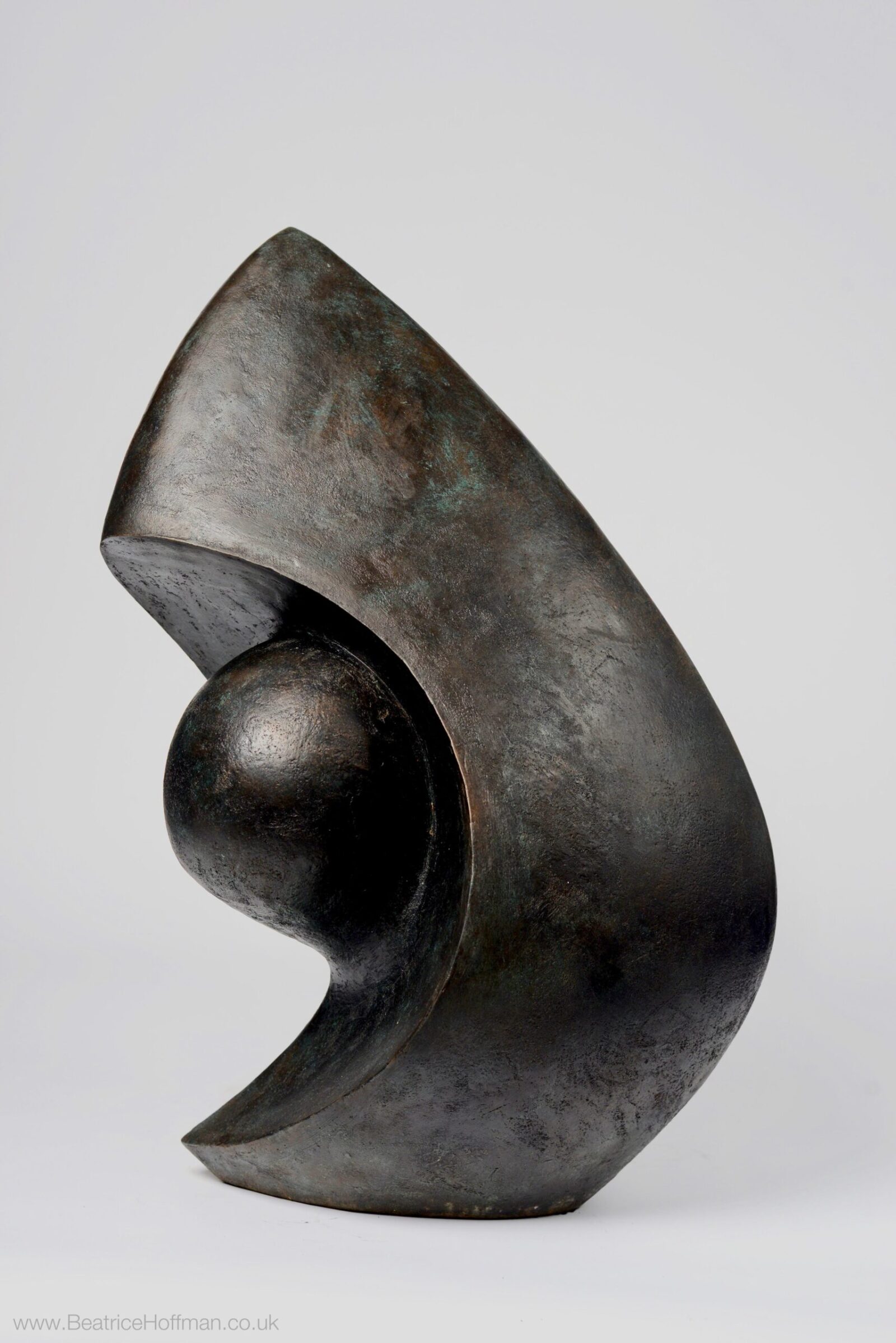 contemporary bronze sculpture of a double head based on Picasso
