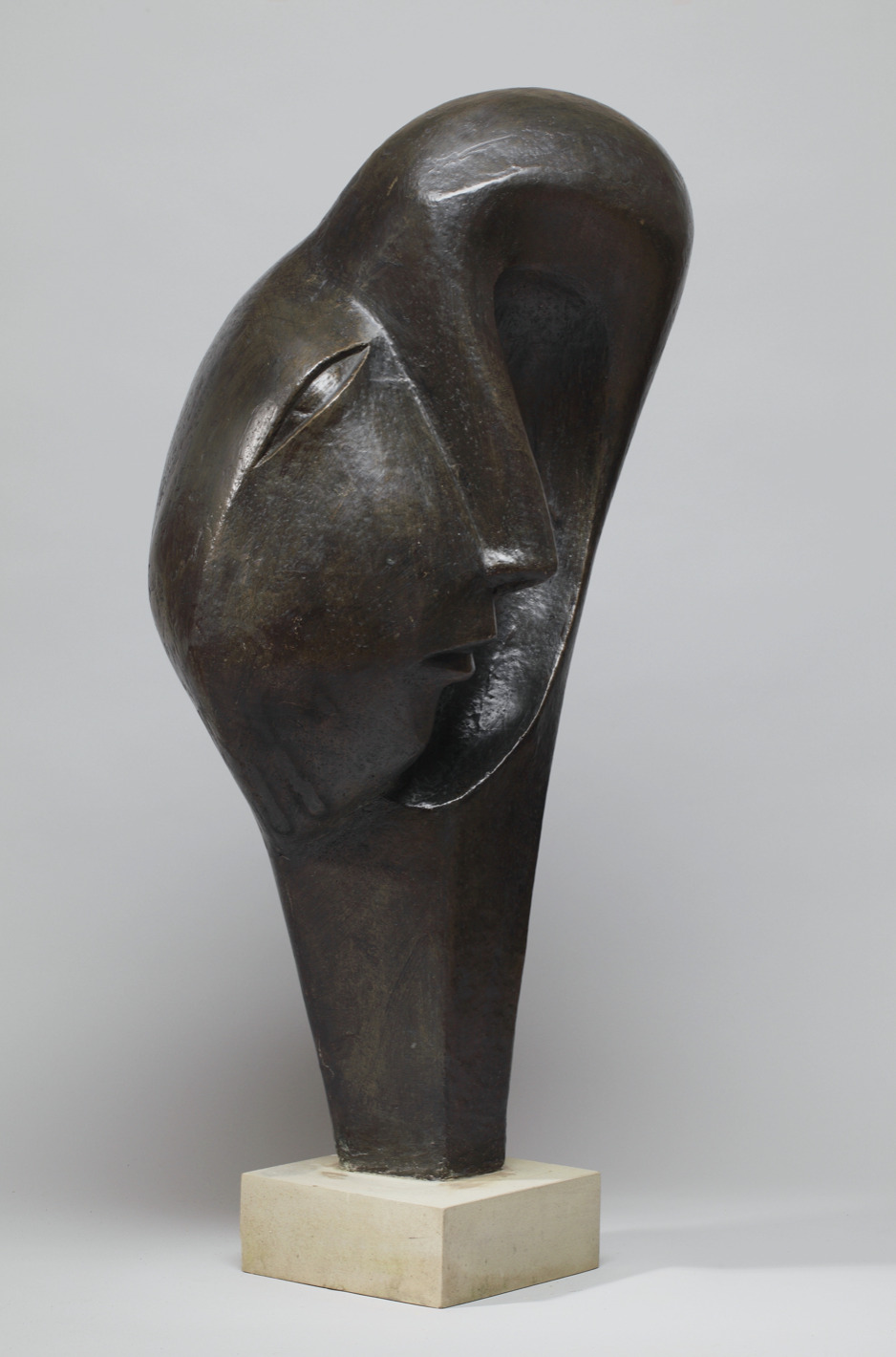 Contemporary abstract bronze sculpture of a head for the garden