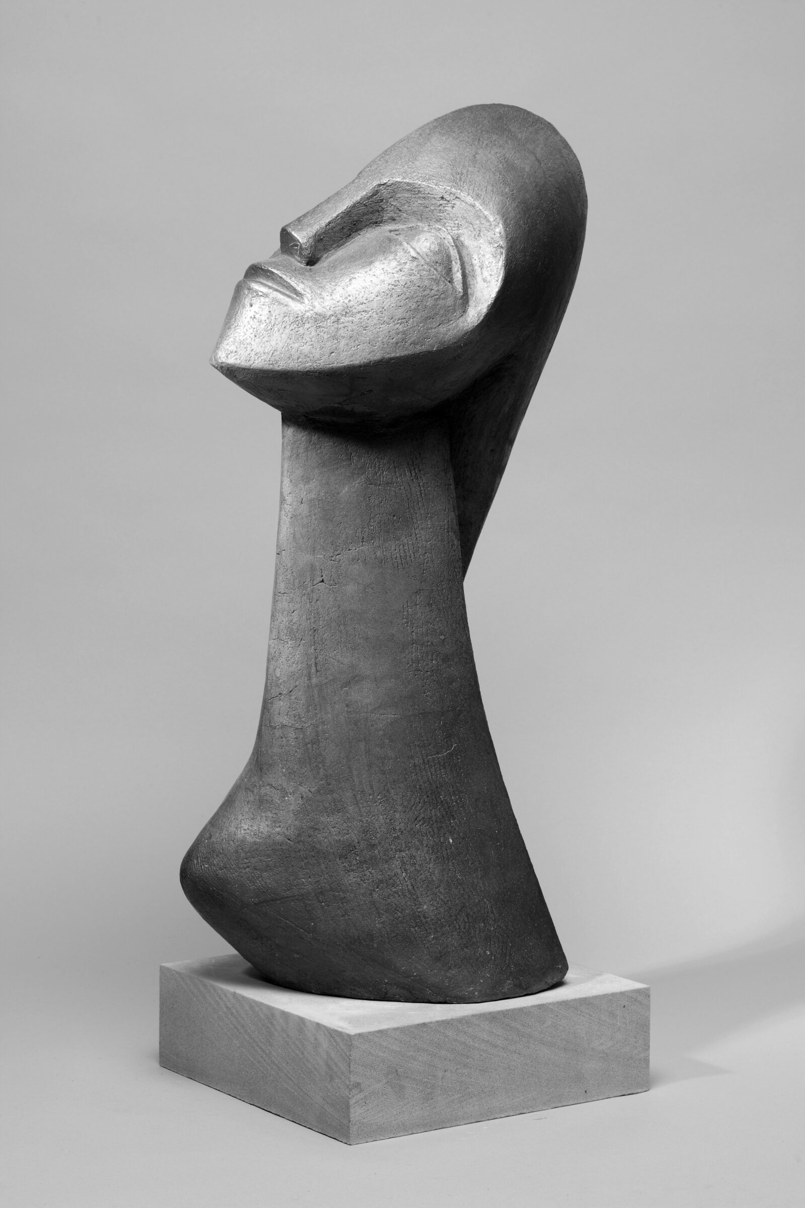 modernist ceramic sculpture of head inspired by Picasso and African carving