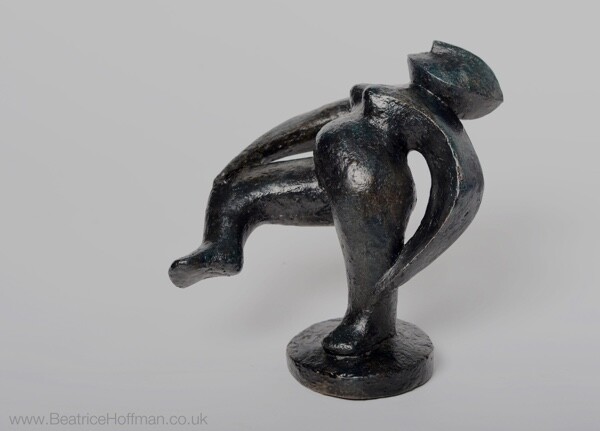 figurative bronze interior sculpture depicting a dancing woman