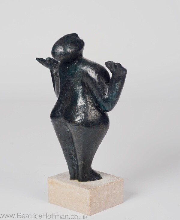 contemporary bronze sculpture of a standing figure for the home