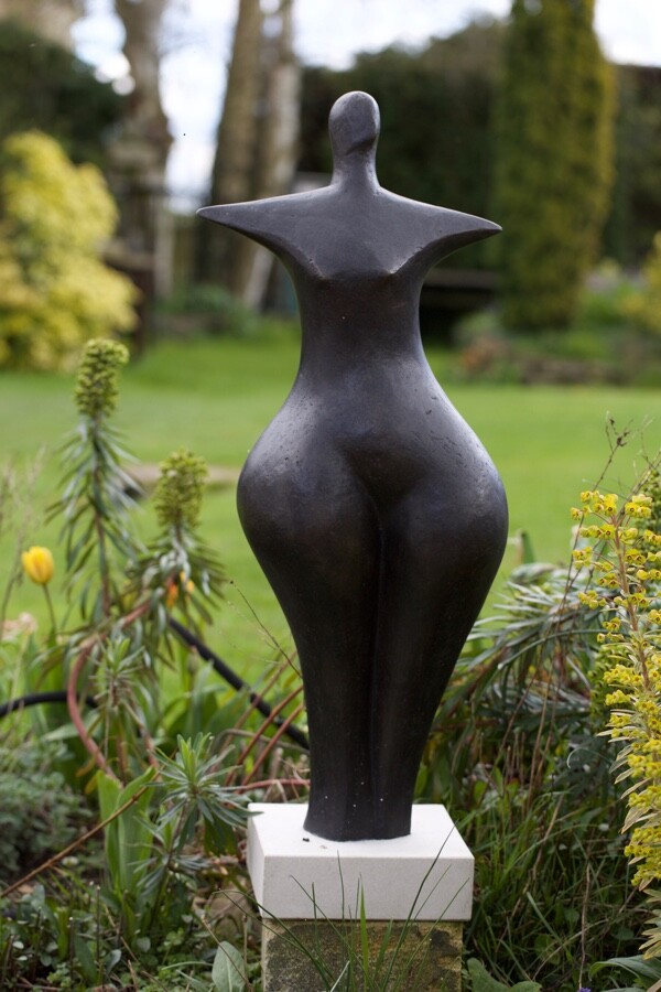 contemporary bronze sculpture of a standing abstract figure for garden or interior design