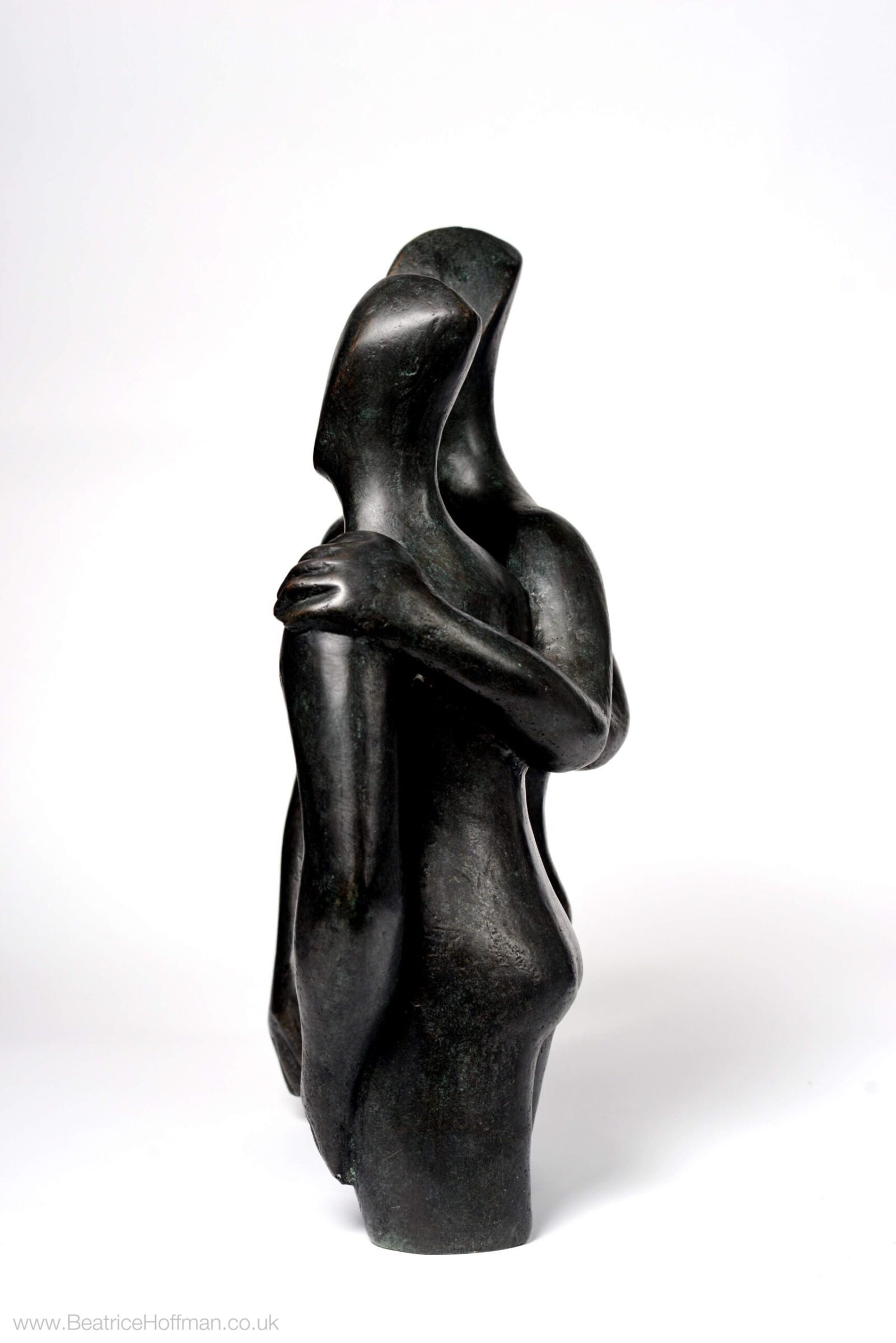 contemporary bronze sculpture of a couple suitable for the garden or a wedding present