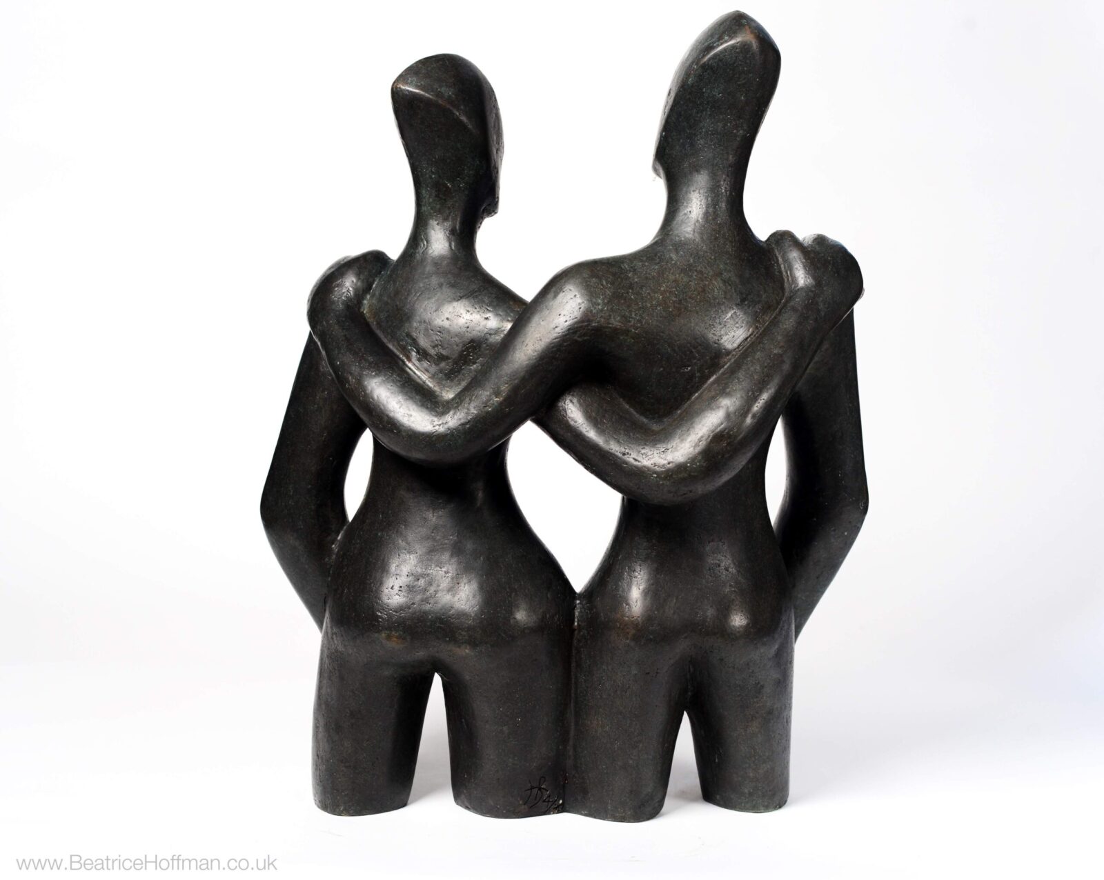 contemporary bronze sculpture of a couple suitable for the garden or a wedding present