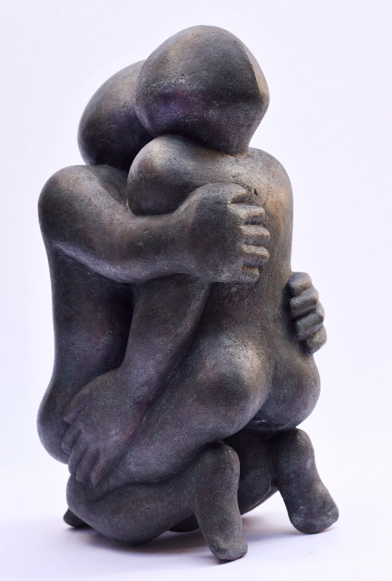 contemporary bronze sculpture of an affectionate hug suitable for a wedding present