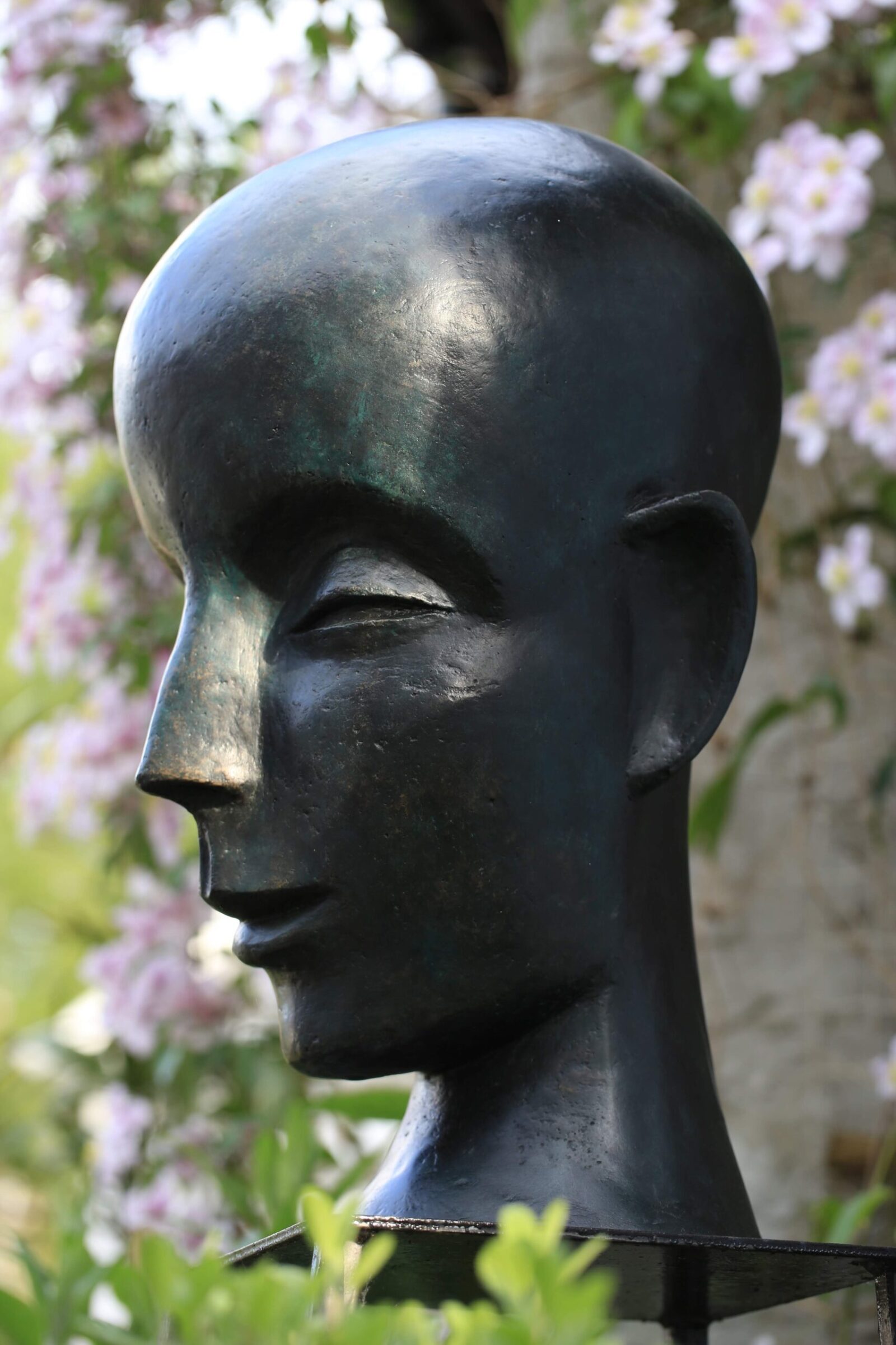 contemporary bronze sculpture of a buddha head