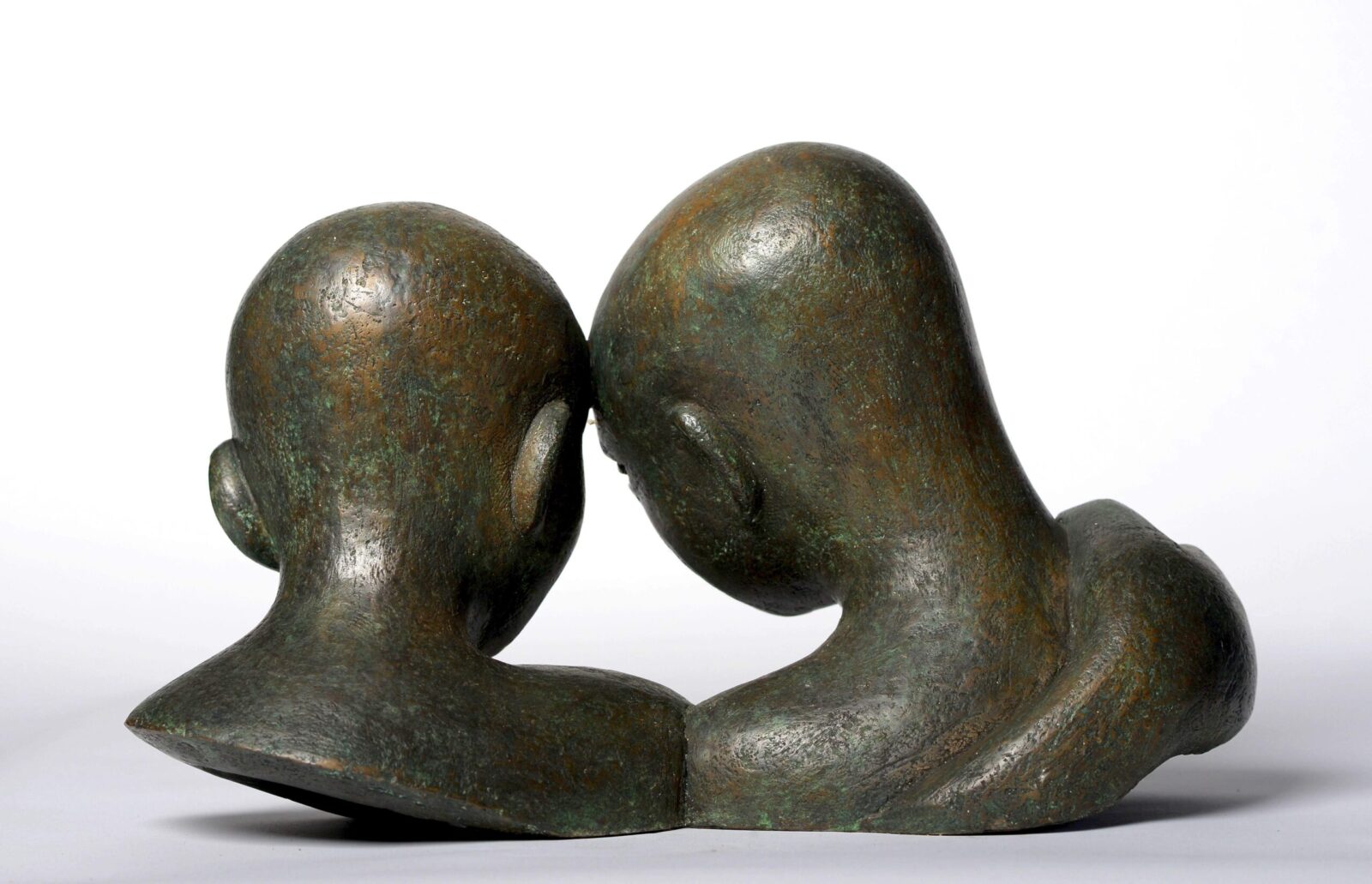 contemporary sculpture of two childrens heads suitable for the home