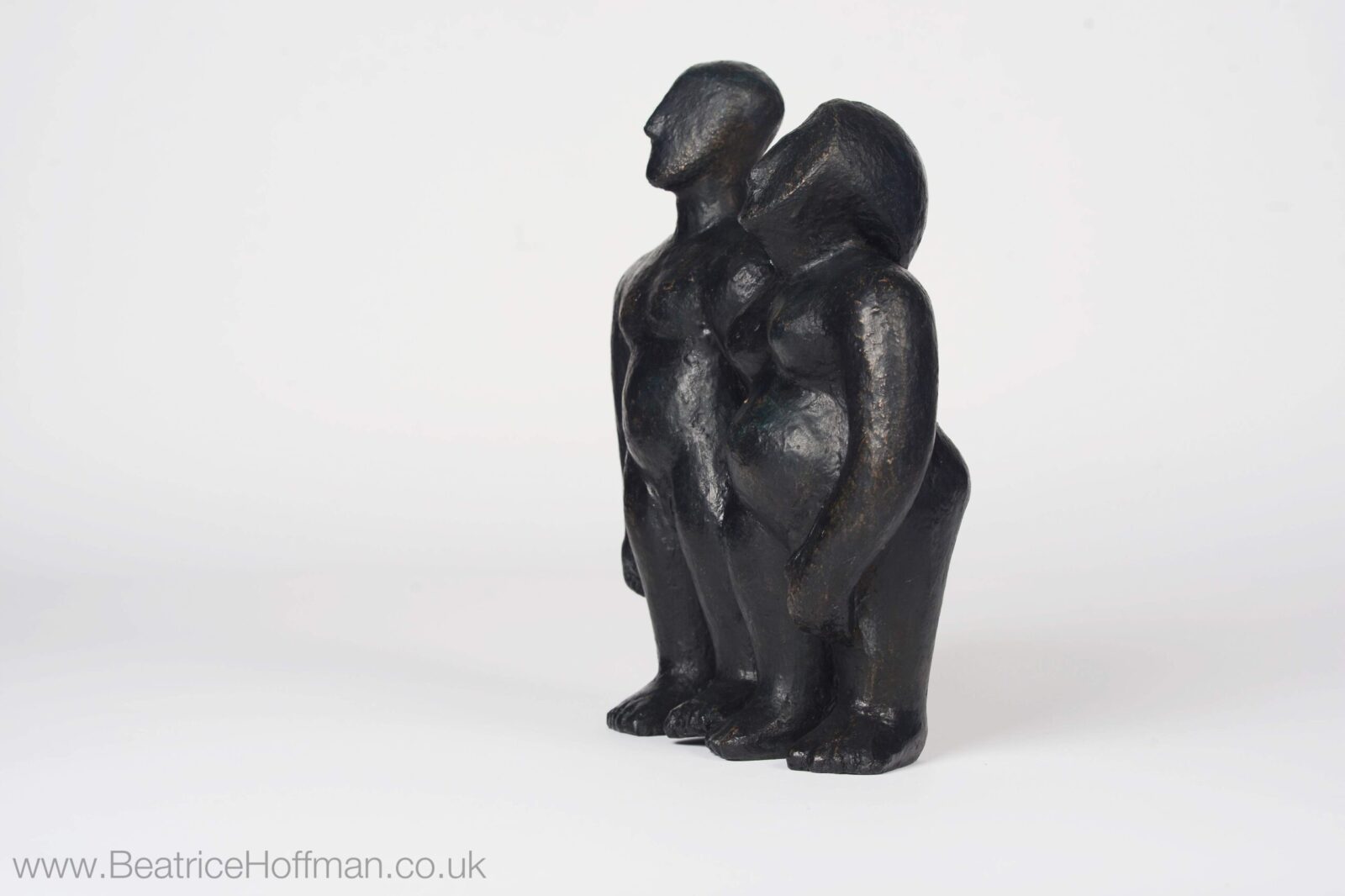 modern humorous bronze sculpture of a couple for a wedding anniversary