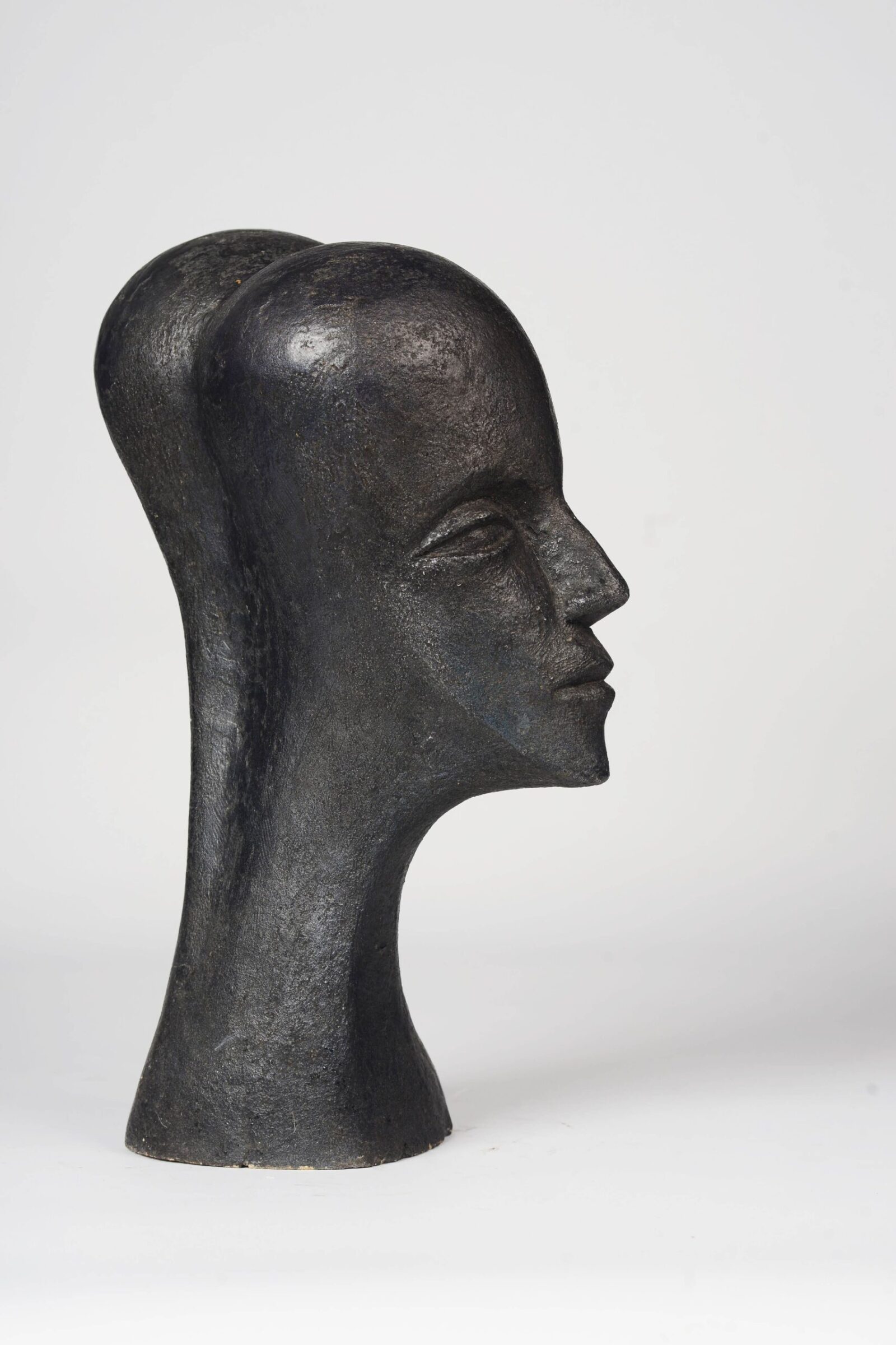 modern sculpture of a double head