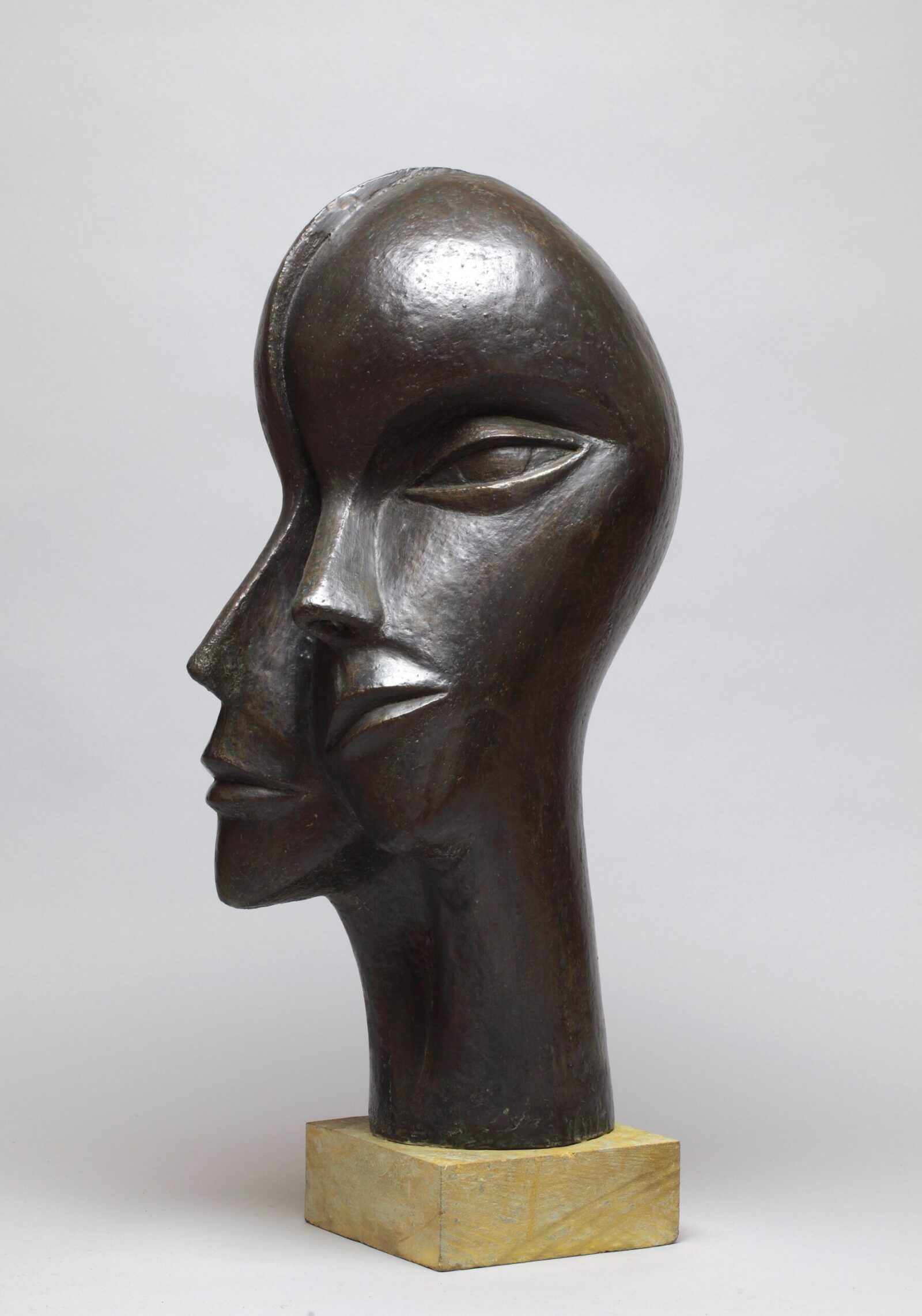 contemporary garden bronze sculpture of a n double head based on Picasso