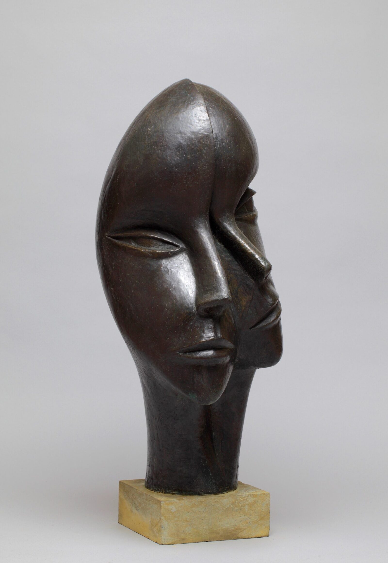 contemporary garden bronze sculpture of a n double head based on Picasso