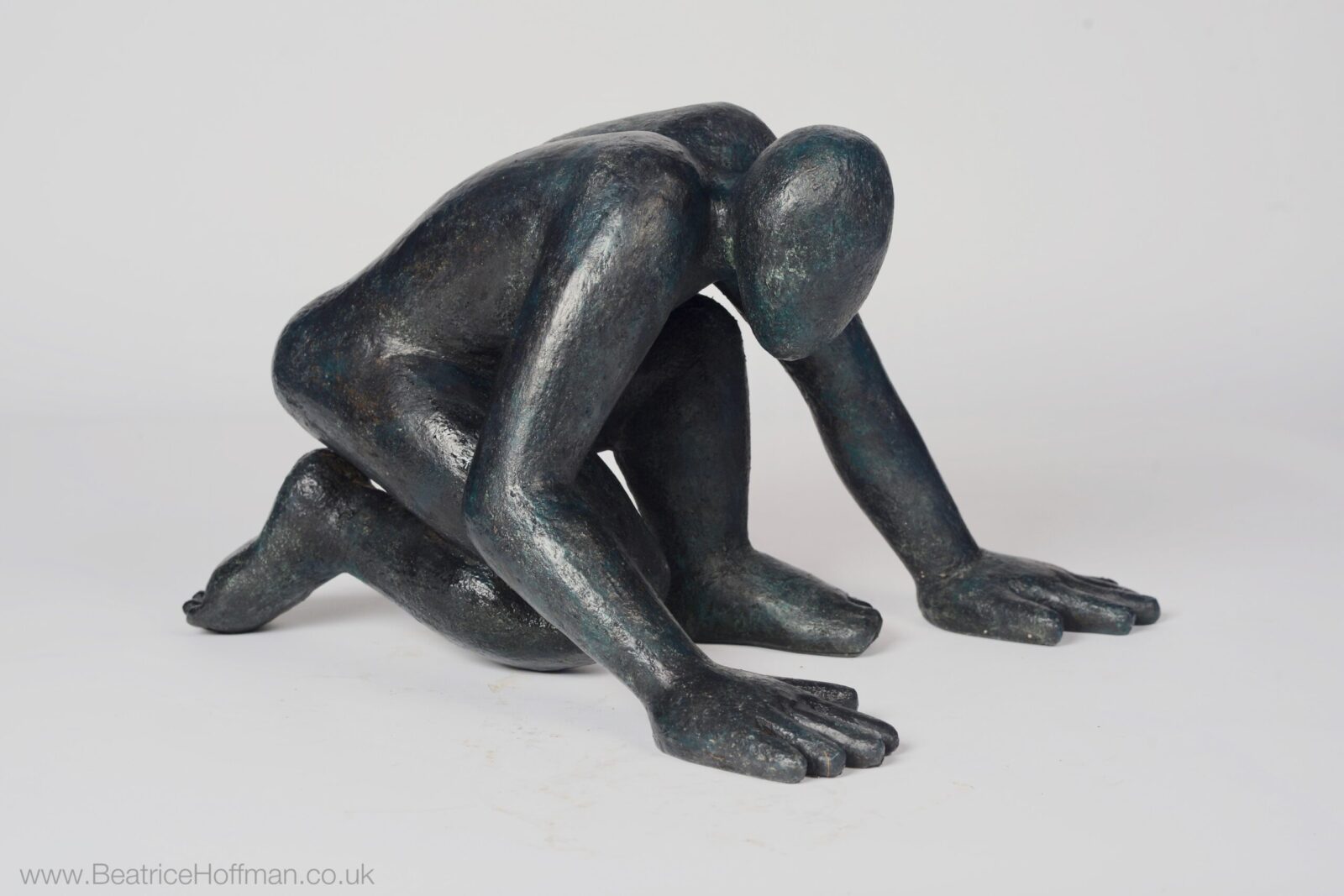 modern bronze figure sculpture for interior design based on olympic commission
