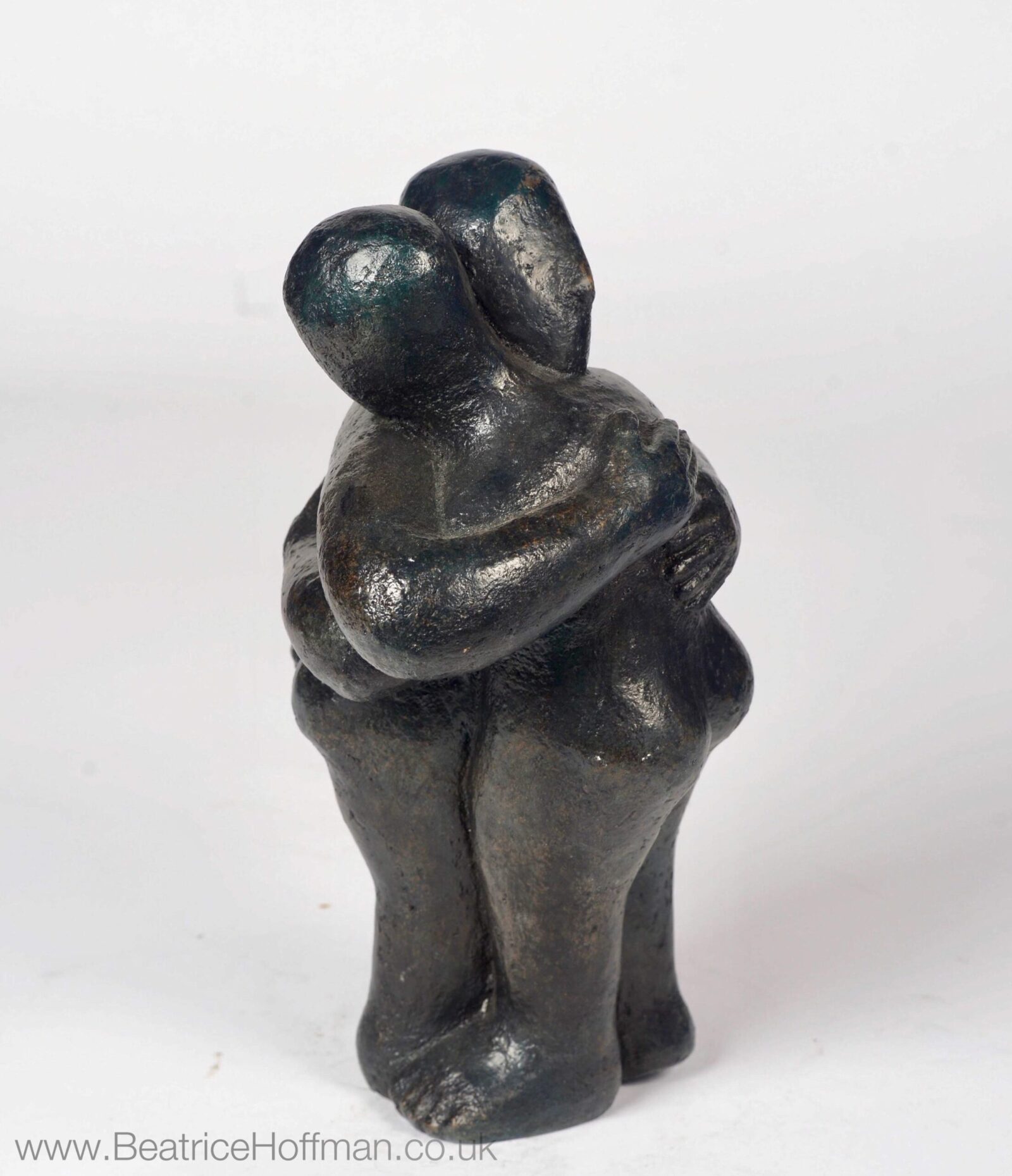 modern affectionate bronze sculpture of a hugg for a wedding anniversary