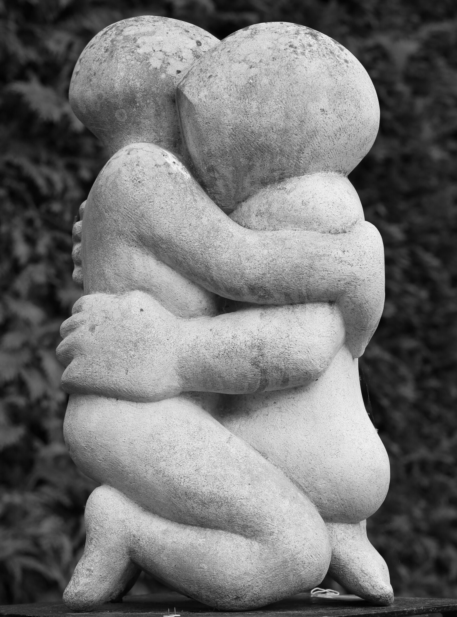 contemporary stone sculpture of an erotical couple