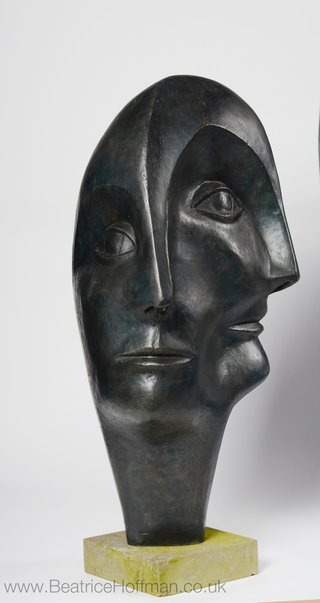 Contemporary abstract bronze sculpture of a head for art collectors