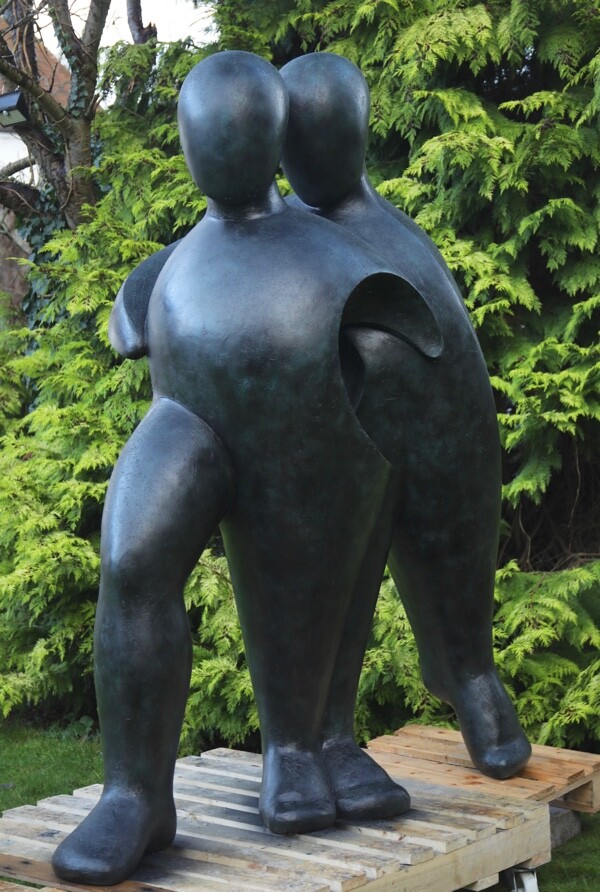 Large hospital commissioned bronze sculpture of two supportive figures