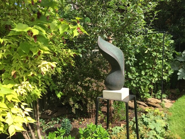 Contemporary abstract floral bronze sculpture for gardens or interiors