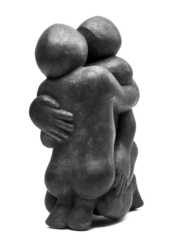 contemporary bronze sculpture of an affectionate hug suitable for a wedding anniversary