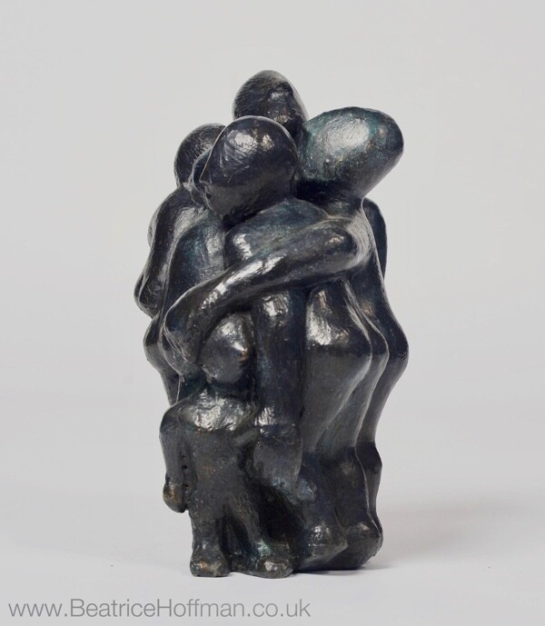 small modern bronze sculpture of a close group of figures