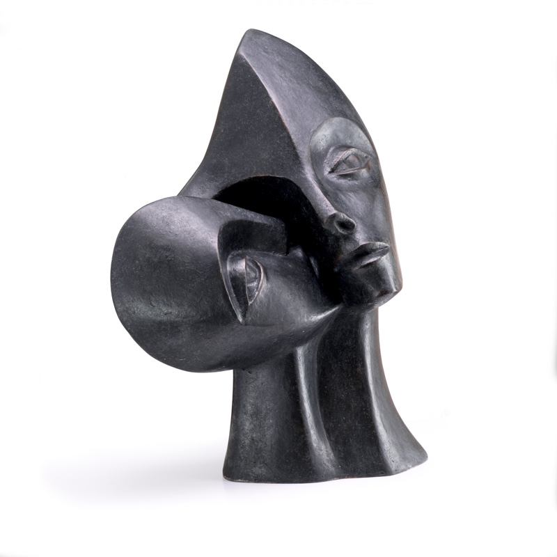 contemporary garden bronze sculpture of a double head loosely based on Picasso